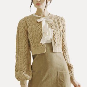 Storia Cable Knit Cardigan with Silk Bow Tie in Camel